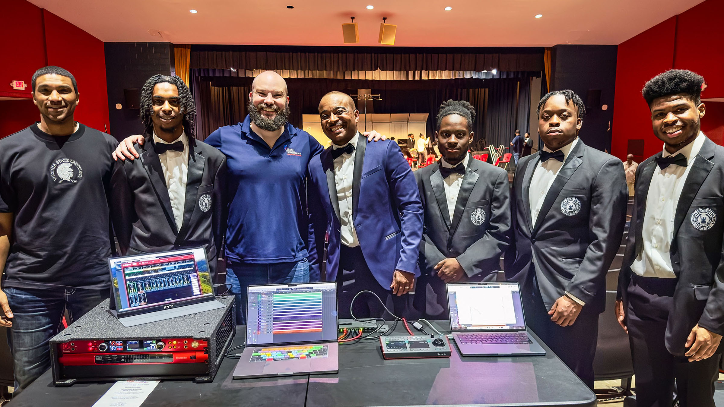 Pictured L-R: VSU Instructor of Music Production Technology Corey Brown; VSU Wind Symphony member David Williams; Coordinator of Music Production Technology Dustin Painter; Dr. Samuel Rowley (Chairman of the Department of Music, Director of Bands – Wind Activities and Professor of Music); and Wind Symphony members Wayne Ayisi-Bampoe, Kahlib Newman, and Jason Vance II. Pictured L-R: VSU Instructor of Music Production Technology Corey Brown; VSU Wind Symphony member David Williams; Coordinator of Music Production Technology Dustin Painter; Dr. Samuel Rowley (Chairman of the Department of Music, Director of Bands – Wind Activities and Professor of Music); and Wind Symphony members Wayne Ayisi-Bampoe, Kahlib Newman, and Jason Vance II.